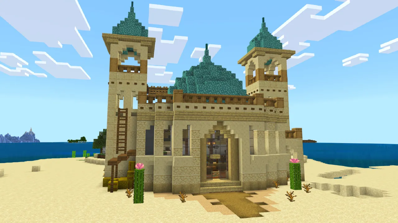 Desert home with two towers by the sea